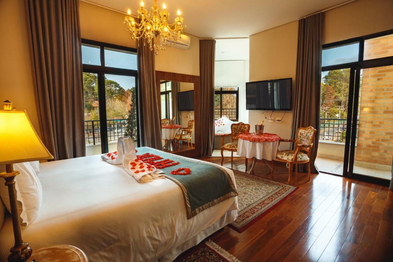 Pousada Luis XV กังโปสดูจอร์เดา ภายนอก รูปภาพ A bedroom at the hotel